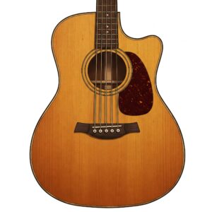 Illustration outlining the larger, square-shouldered body shape of a dreadnought acoustic guitar. Dreadnought vs Concert guitar