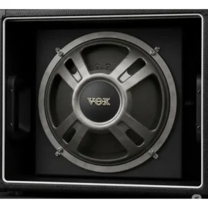 High-quality speaker component within a vox bass guitar amp, delivering clear and articulate bass frequencies.