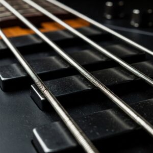 Image highlighting long-scale flatwound bass guitar strings.