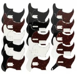 "Collection of Fender Jazz Bass pickguards in various colors, including black, white, and tortoiseshell."