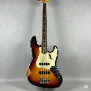 Vintage Fender bass for sale, showing its aged finish and timeless design, perfect for collectors.
