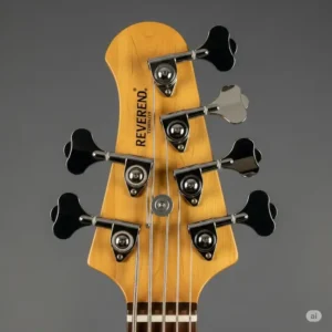 Clear image of a Reverend bass headstock with tuning pegs, highlighting the precise tuning stability and classic design.