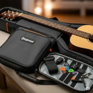 An Orangewood guitar resting inside its included padded gig bag, emphasizing the protective case and accessories.