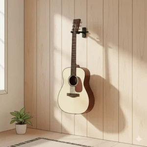 An acoustic guitar securely and elegantly displayed on a wall using a modern guitar wall mount.