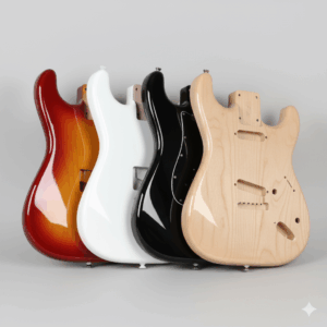 A collection of Stratocaster guitar bodies displayed in various popular finishes like black, Olympic white, and cherry sunburst.