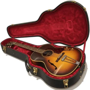 A detailed image of a Kalamazoo guitar's serial number on the back of the headstock, a key feature for dating and authenticating the instrument. 