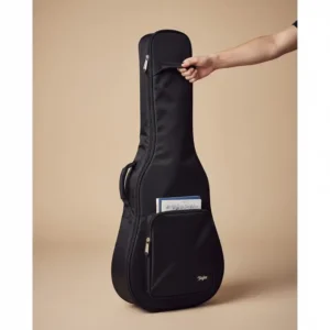 The Taylor Big Baby guitar packed securely in its padded gig bag, emphasizing its portability and suitability for travel.