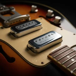 Close-up of the characteristic DeArmond pickups used on the Fender Coronado guitar II, known for their unique tone.