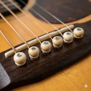 The natural cream colored patina of high quality aged bone bridge pins over time.