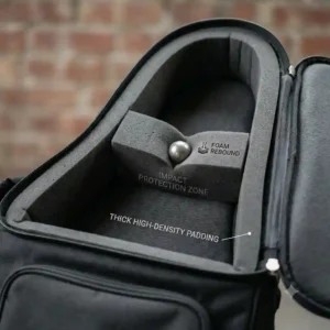 Close-up illustration of the thick foam padding inside a bass guitar soft case to protect against impact.